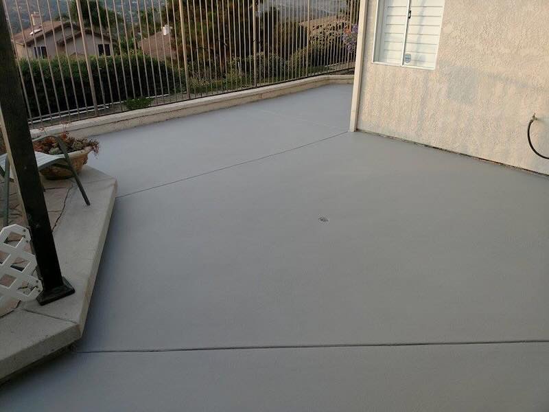 After: Smooth gray microtopping sidewalk finish